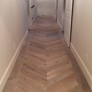 Wood chevron floor in a hall